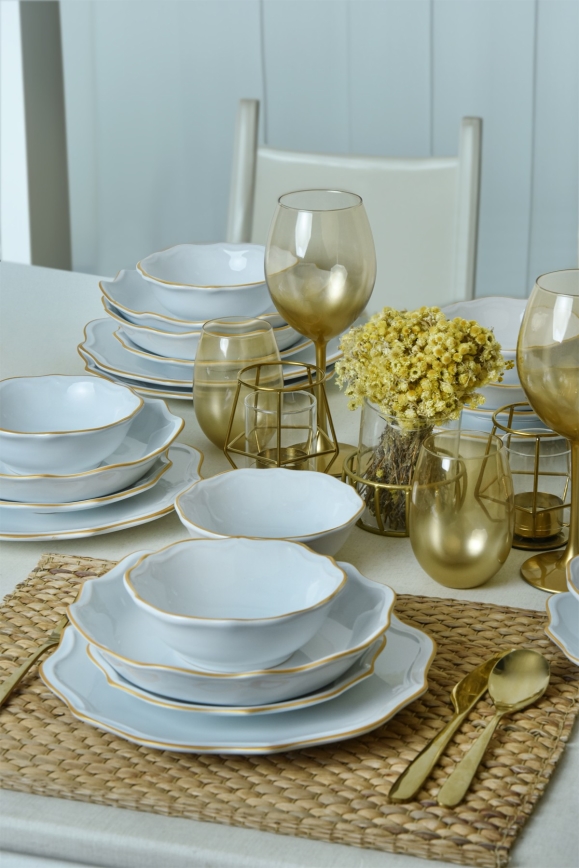 24-teiliges Steingut-Geschirrset in Weiß mit goldenen Akzenten