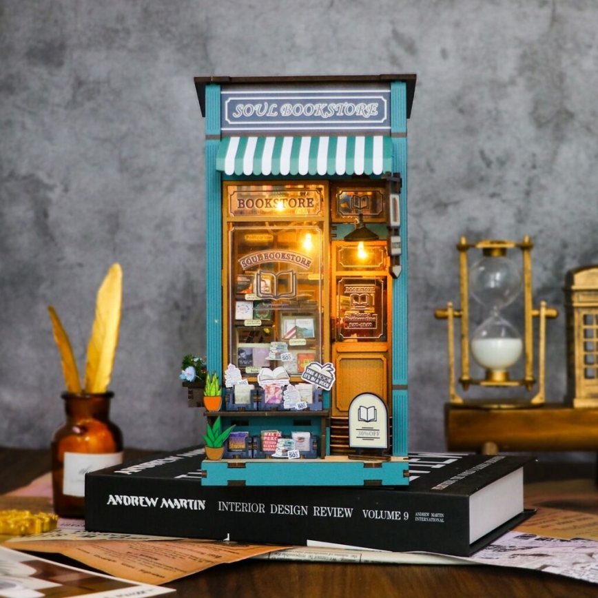 2Kids Toys - 3D-Puzzle LED-Buchstütze Buchhandlung für die Seele 2xAAA