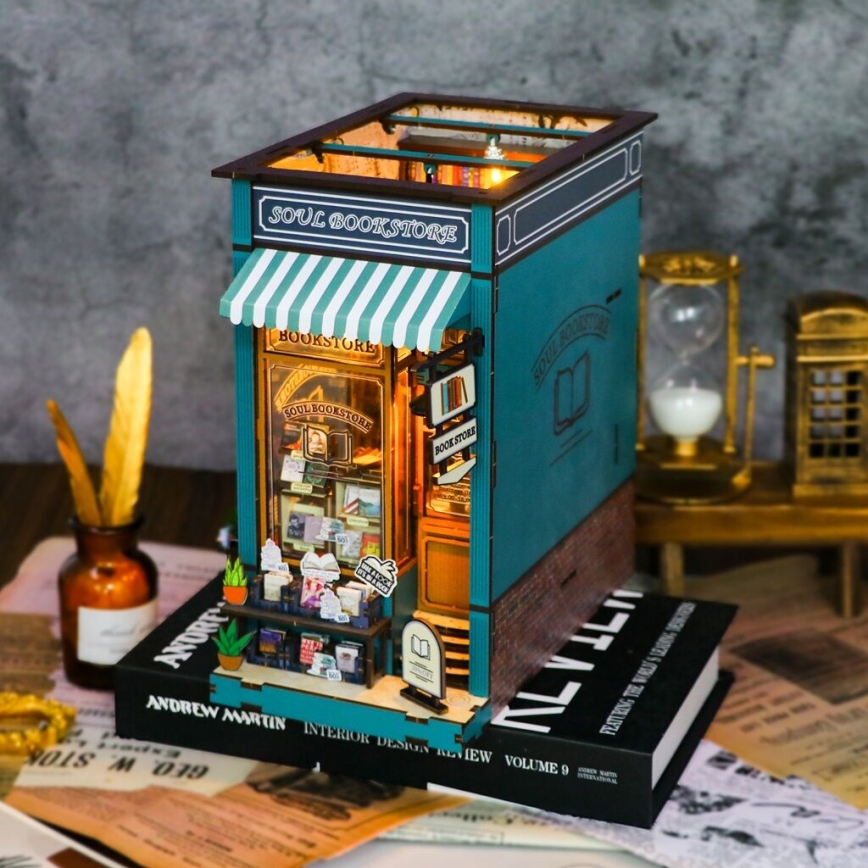 2Kids Toys - 3D-Puzzle LED-Buchstütze Buchhandlung für die Seele 2xAAA