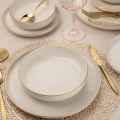 8-teiliges Speiseservice, weiß/gold, aus Porzellan
