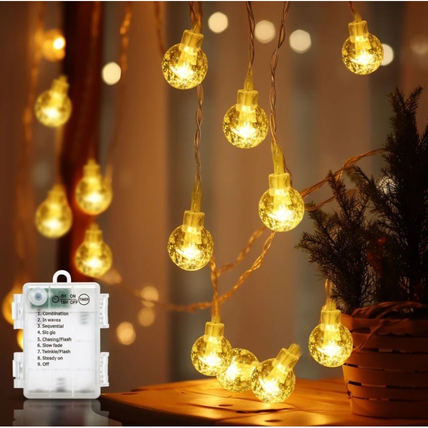 Aigostar - LED-Außen-Weihnachtslichterkette 100xLED/3xAA/8 Funktionen 10,3 m IP44 warmweiß