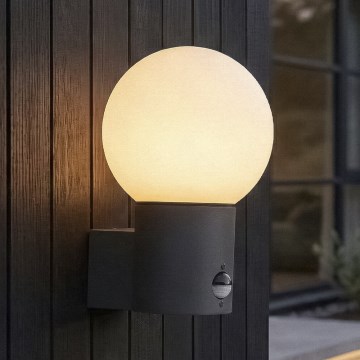 Außenwandleuchte mit Bewegungs- und Dämmerungssensor STONO 1xE27/15W/230V IP65 anthrazit