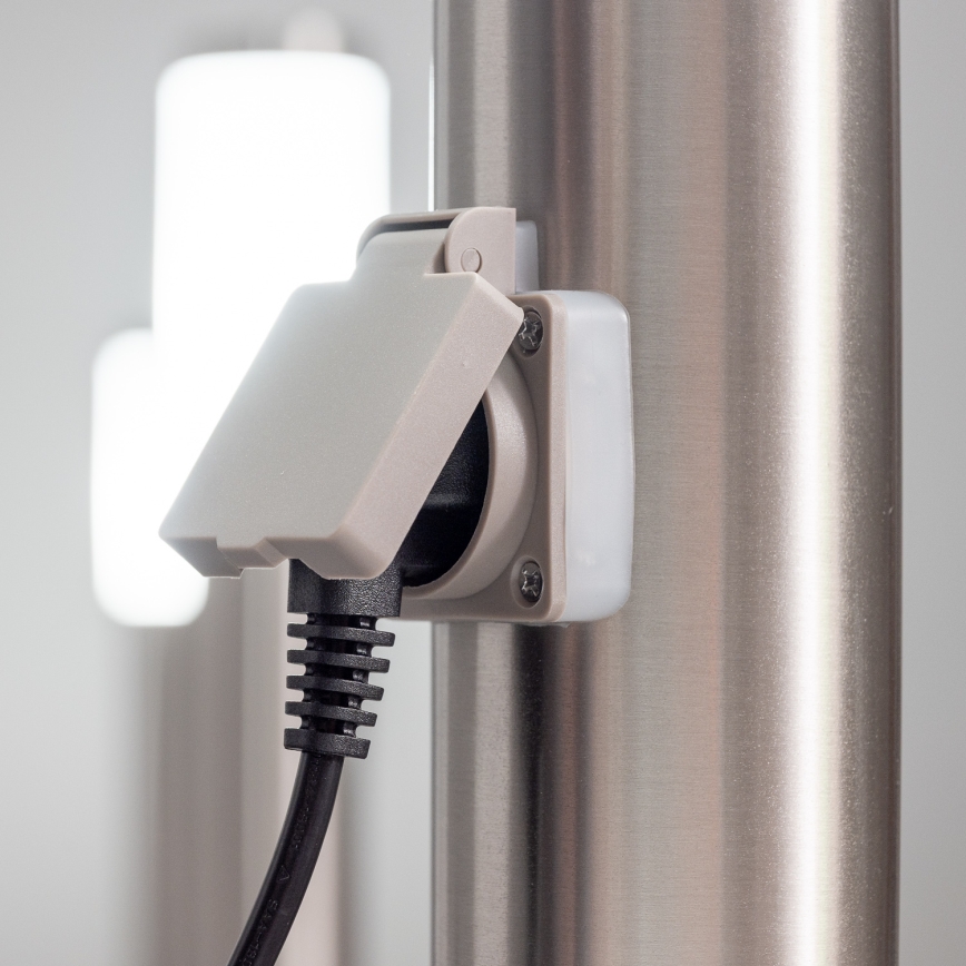 BRILAGI - Außenleuchte mit integrierter Steckdose ELIA 1x E27/20 W/230 V IP44 50 cm mattchrom