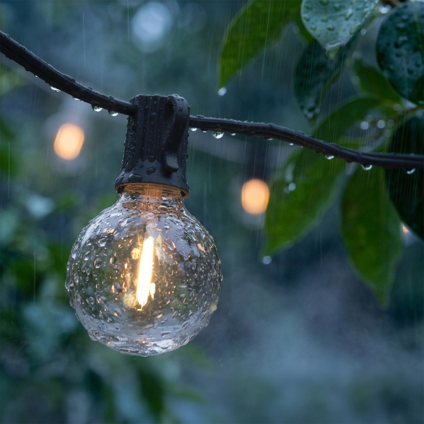 Brilagi - LED-Außen-Dekorations-Lichterkette GIRLANDA 25xE12/0,36W/24V 20m schwarz IP44 warmweiß