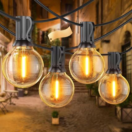 Dimmbare LED-Außen-Dekorations-Lichterkette 25xE12/1W/24/230V 17,5 m IP65 schwarz + Fernbedienung