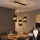 LED-Kronleuchter mit Seilaufhängung BOGART 3xE27/15W/230V Schwarz/Gold