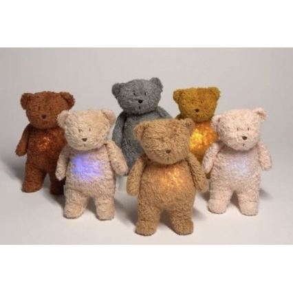 Moonie - Kuscheltier mit Melodie und Licht Polarbär