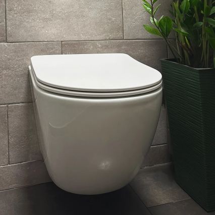 REA-C1259 - Wand-WC mit WC-Sitz CARLO MINI TORNADO RIMLESS Keramik/glänzend weiß